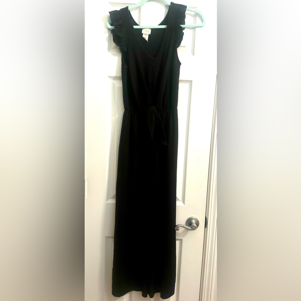Black cotton flowy (size small) pants romper. Dress up or down .